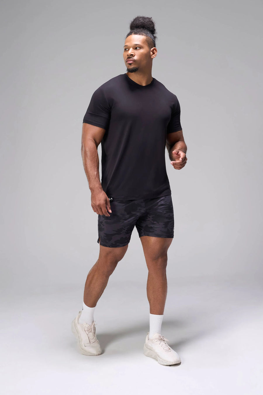 Black Bamboo V Neck Essential Tee showing relaxed side silhouette and breathable bamboo performance fabric by TLF Apparel – side view