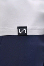 Gray Bamboo V Neck Essential Tee showing ultra soft bamboo fabric texture and silicone icon label detail by TLF Apparel – detail view