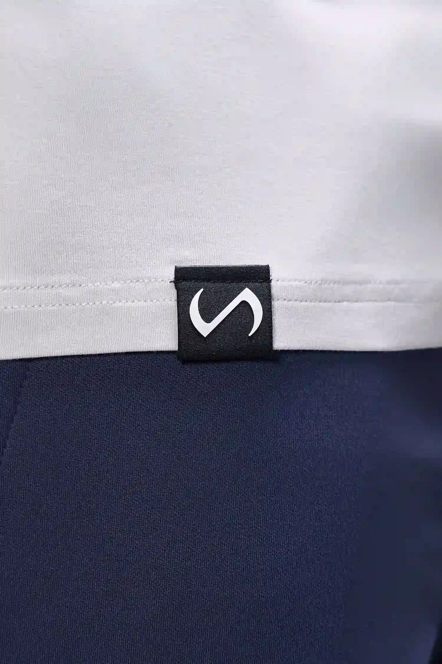 Gray Bamboo V Neck Essential Tee showing ultra soft bamboo fabric texture and silicone icon label detail by TLF Apparel – detail view