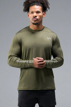 Front View of Green TLF Train Infi-Dry Long Sleeve, featuring our Infi-Dry fabric technology and reflective sleeve design for night running