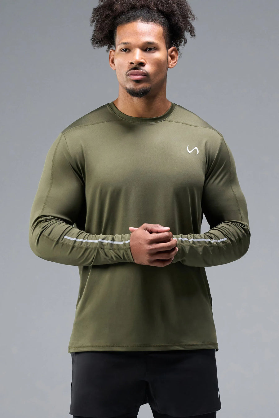 Front View of Green TLF Train Infi-Dry Long Sleeve, featuring our Infi-Dry fabric technology and reflective sleeve design for night running
