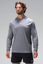 Gray Pluma UPF Sun Hoodie showing raglan sleeves, side panels, and athletic fit by TLF Apparel – front view