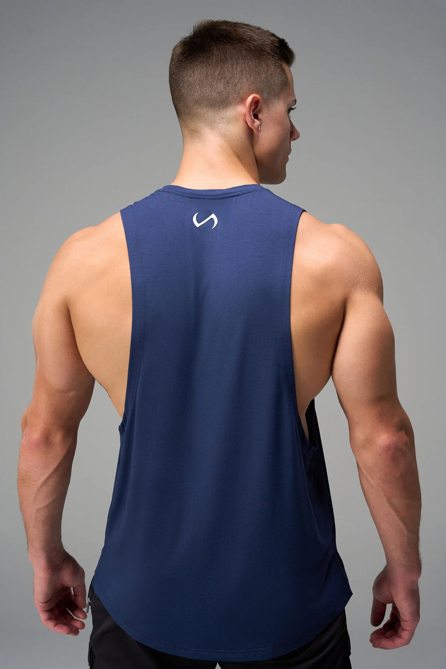 Blue Further Air-Flex Drop Arm Tank with breathable 4-way stretch fabric and athletic fit for workouts and daily wear by TLF Apparel – back view