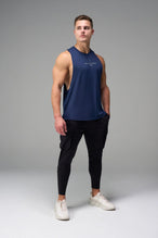 Blue Further Air-Flex Drop Arm Tank showing drop arm silhouette and breathable performance fabric by TLF Apparel – side view