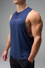 Blue Further Air-Flex Drop Arm Tank showing ultra-soft performance fabric and Take Life Further® chest logo detail by TLF Apparel – detail view