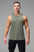 Green Further Air-Flex Drop Arm Tank showing ultra-soft performance fabric and Take Life Further® chest logo detail by TLF Apparel – detail view