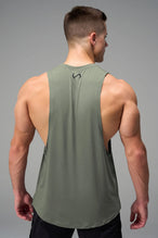 Green Further Air-Flex Drop Arm Tank showing drop arm silhouette and breathable performance fabric by TLF Apparel – side view