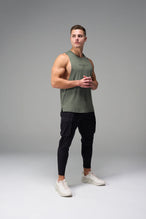 Green Further Air-Flex Drop Arm Tank showing athletic side profile and lightweight training fabric by TLF Apparel – side view