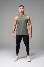 Green Further Air-Flex Drop Arm Tank breathable performance tank designed for training and Gym-To-Street® wear by TLF Apparel – front view
