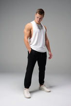 White Further Air-Flex Drop Arm Tank showing drop arm silhouette and breathable performance fabric by TLF Apparel – side view