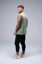 Stone Wash Property Of Dura Cotton Muscle Tank showing boxy fit, wide shoulders and heavyweight cotton construction by TLF Apparel – back view