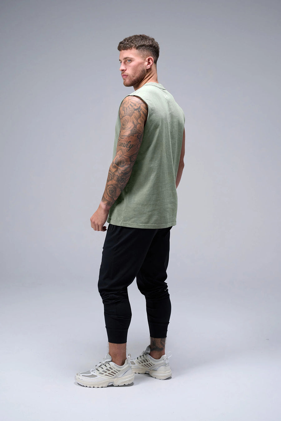 Stone Wash Property Of Dura Cotton Muscle Tank showing boxy fit, wide shoulders and heavyweight cotton construction by TLF Apparel – back view