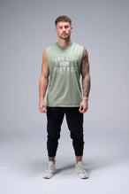 Sage Green Stone Wash Property Of Dura Cotton Muscle Tank with distressed chest graphic, boxy fit and raw edge armholes by TLF Apparel – front view