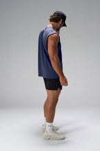  Deep Navy Stone Wash Property Of Dura Cotton Muscle Tank showing boxy streetwear fit, raw edge armholes and heavyweight cotton by TLF Apparel – side view