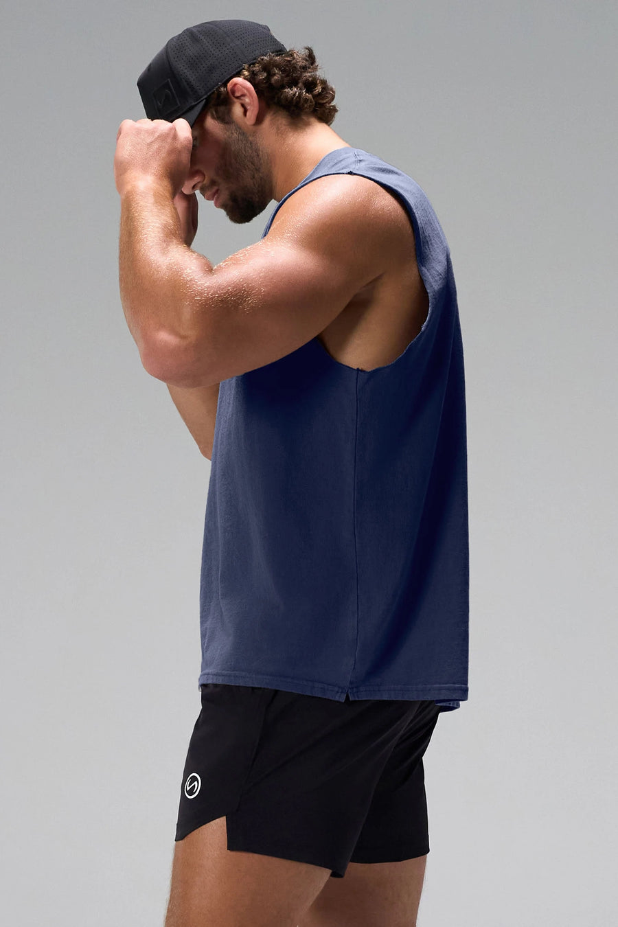 Deep Navy Stone Wash Property Of Dura Cotton Muscle Tank showing raw-cut armholes, wide shoulder fit and stone wash finish by TLF Apparel – side view