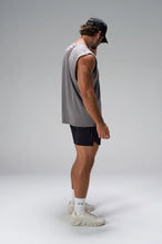 Quiet Shade Stone Wash Property Of Dura Cotton Muscle Tank showing boxy streetwear fit, raw edge armholes and heavyweight cotton by TLF Apparel – side view