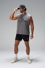 Quiet shade Stone Wash Property Of Dura Cotton Muscle Tank with distressed chest graphic, boxy fit and raw edge armholes by TLF Apparel – front view