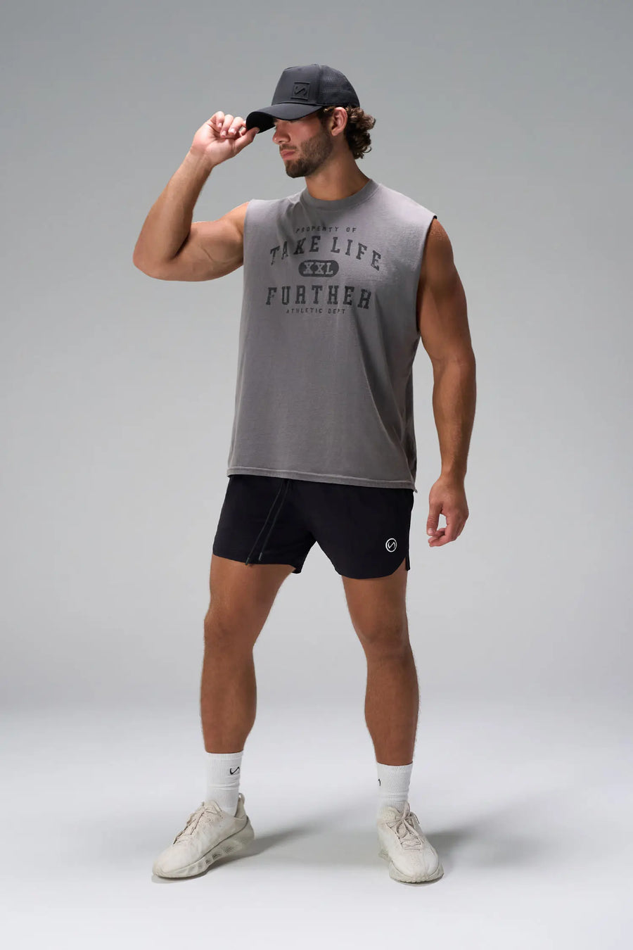 Quiet shade Stone Wash Property Of Dura Cotton Muscle Tank with distressed chest graphic, boxy fit and raw edge armholes by TLF Apparel – front view