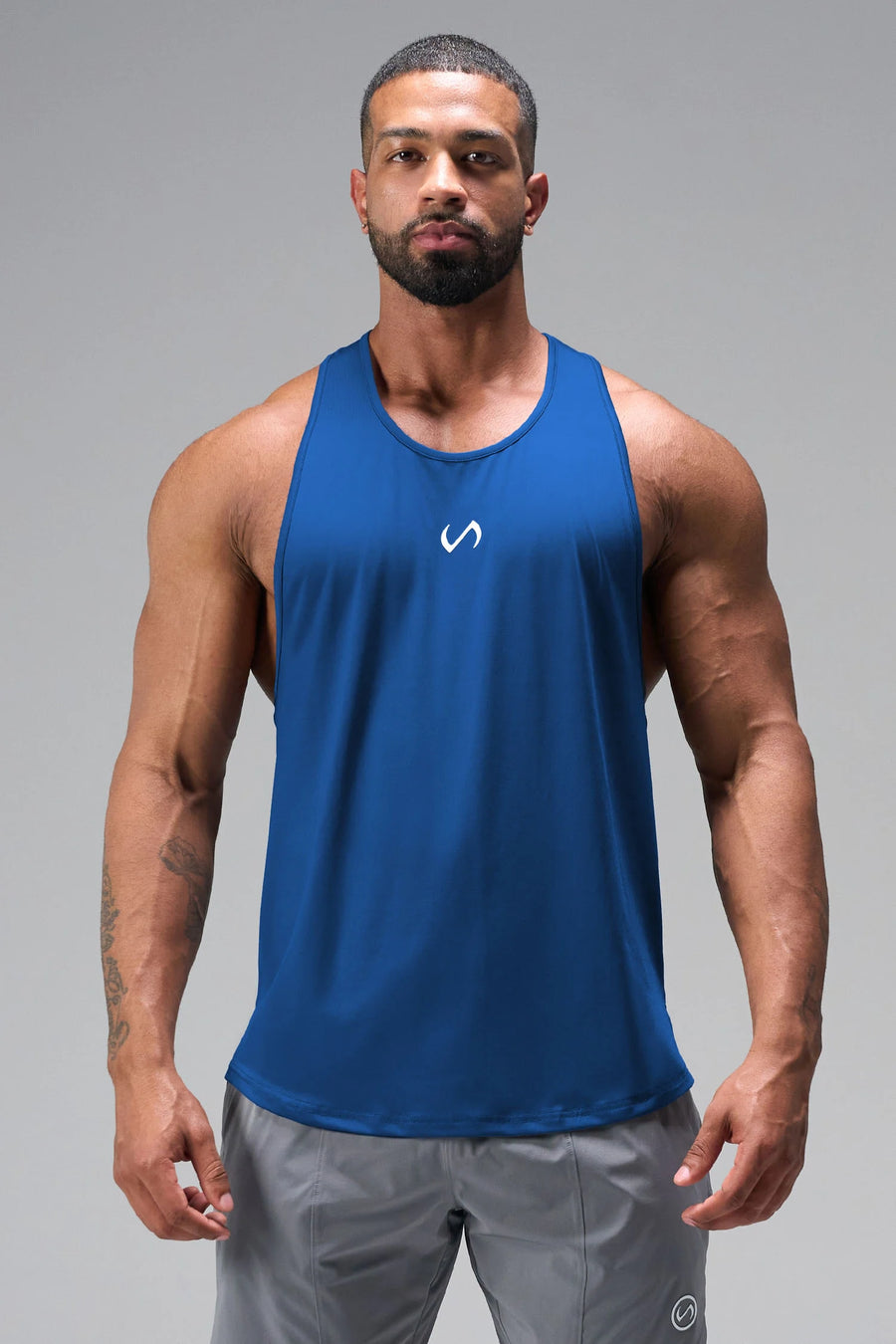 Front View of Blue TLF Infi Dry Stringer Tank featuring a physique enhancing design in our advanced Infi-Dry DNA fabric technology
