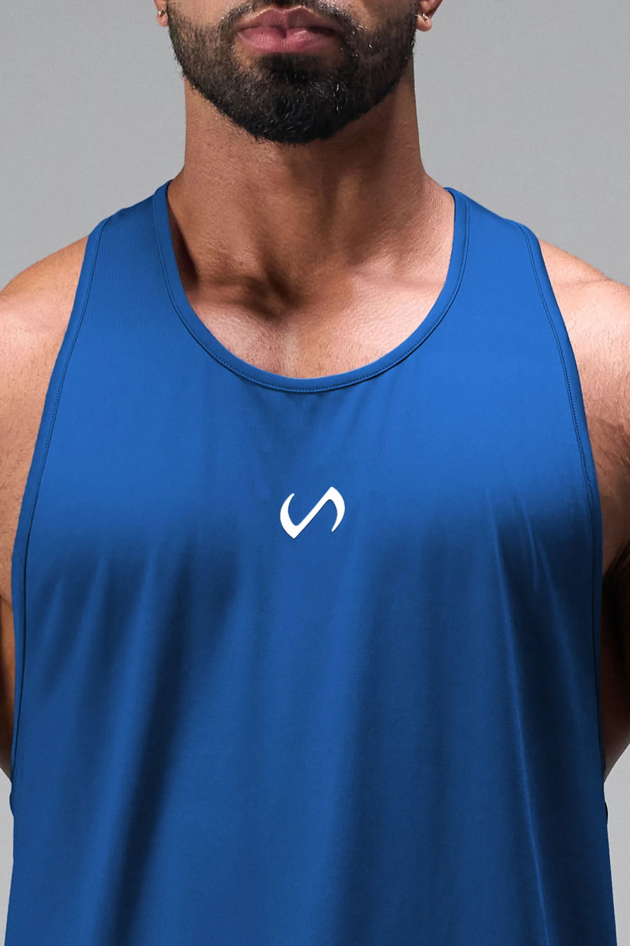 Front View of Blue TLF Infi Dry Stringer Tank featuring a physique enhancing design in our advanced Infi-Dry DNA fabric technology