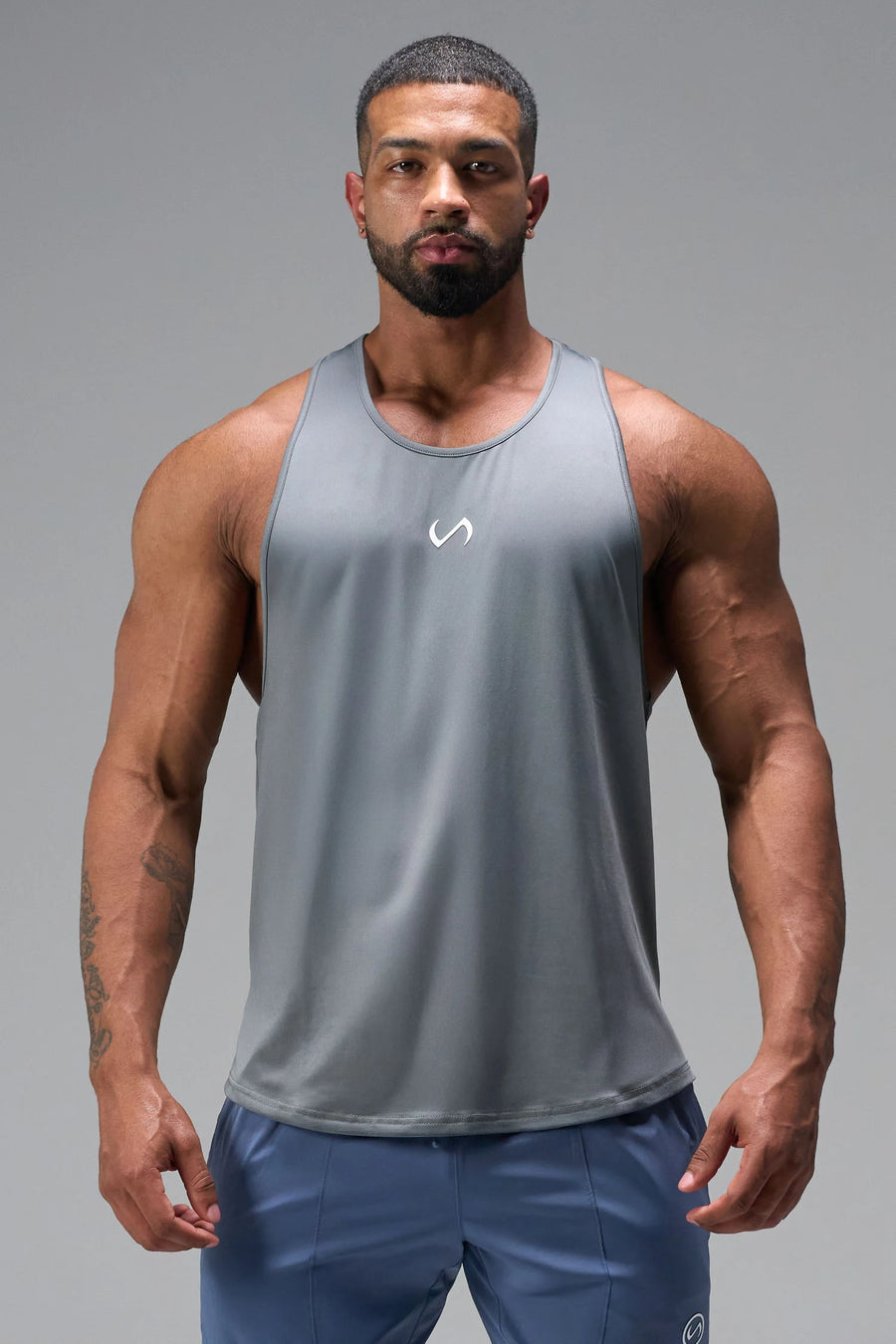 Front View of Gray TLF Infi Dry Stringer Tank featuring a physique enhancing design in our advanced Infi-Dry DNA fabric technology