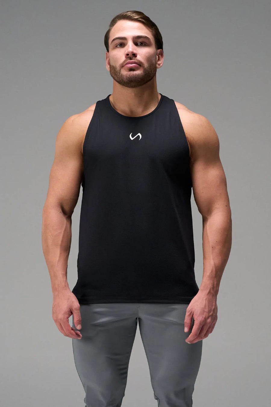 Black Men’s Micro Mesh Tank with a physique-enhancing fit, designed for gym training, HIIT workouts and running by TLF Apparel – front view 