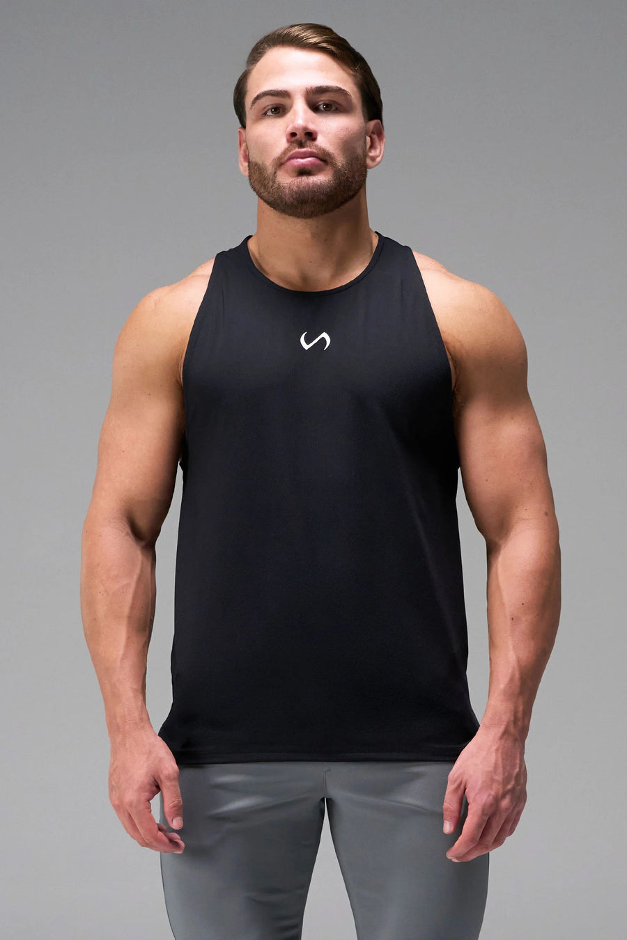 Black Men’s Micro Mesh Tank with a physique-enhancing fit, designed for gym training, HIIT workouts and running by TLF Apparel – front view