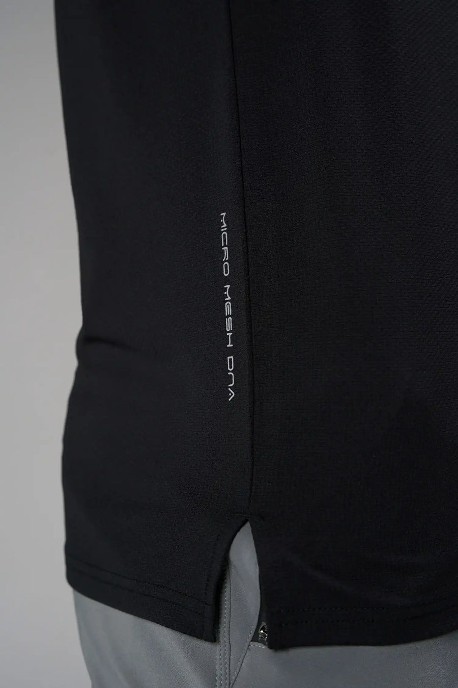 Black Men’s Micro Mesh Tank with a physique-enhancing fit, designed for gym training, HIIT workouts and running by TLF Apparel – side view 