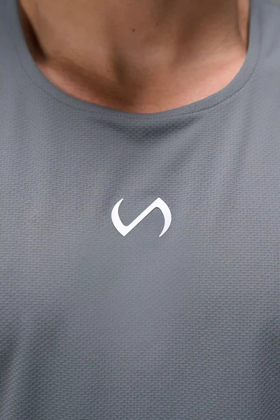 Gray Men’s Micro Mesh Tank with a physique-enhancing fit, designed for gym training, HIIT workouts and running by TLF Apparel – detail front view 