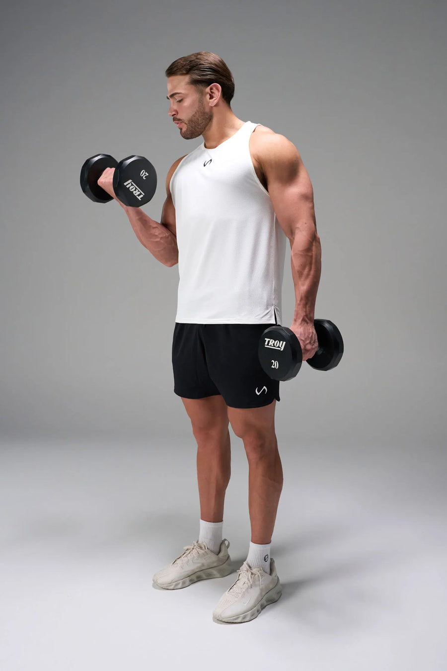 White Men’s Micro Mesh Tank with a physique-enhancing fit, designed for gym training, HIIT workouts and running by TLF Apparel – front view 