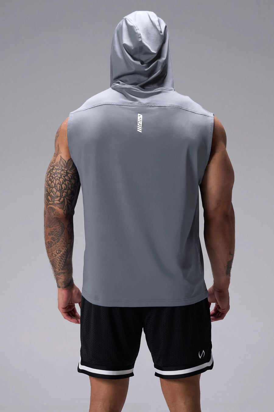 Gray Train Infi Dry Sleeveless Hoodie showcasing athletic fit, structured hood, and performance-driven design by TLF Apparel – back view
