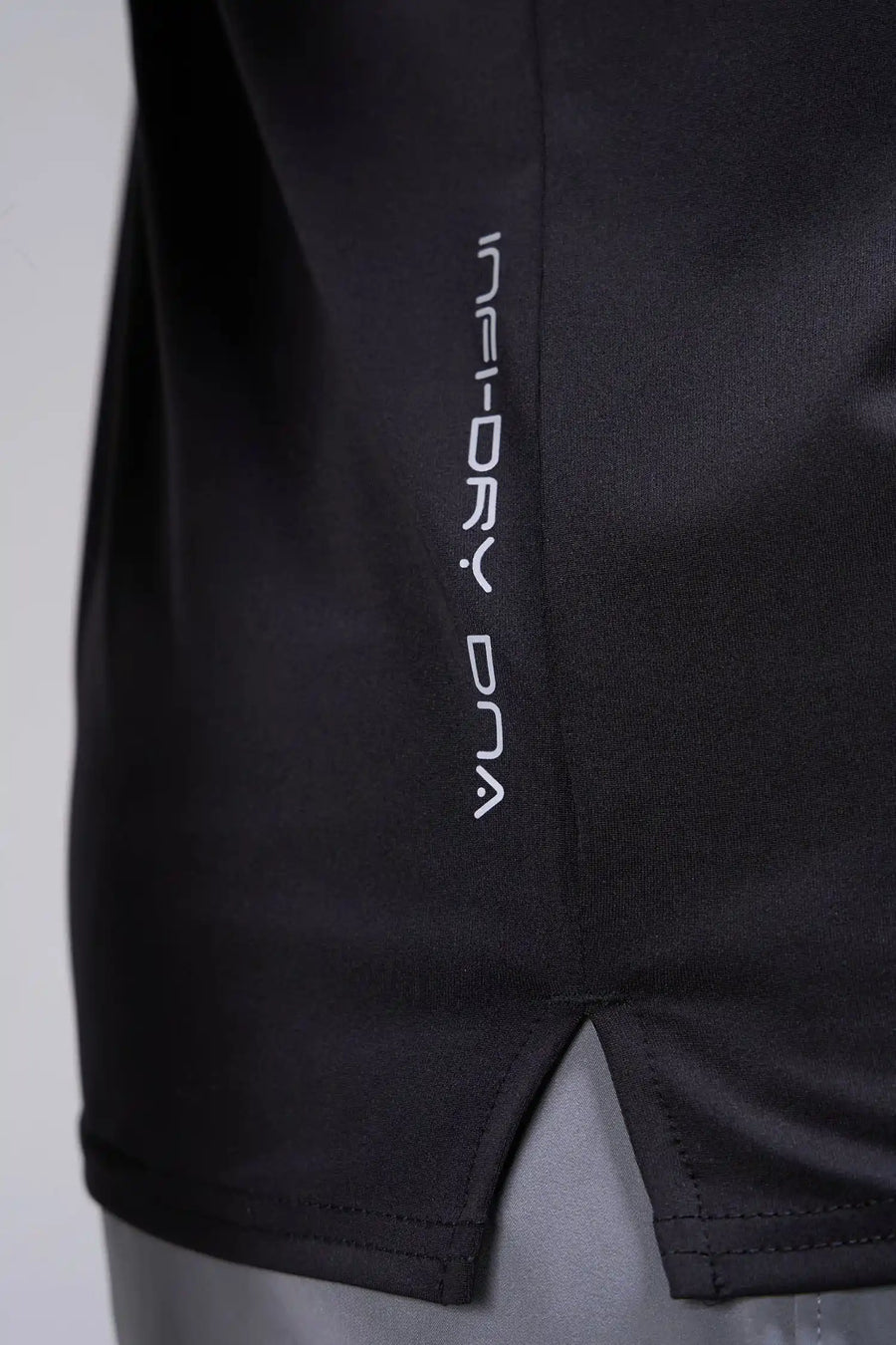 Black Infi-Dry Muscle Tank with drop armhole construction, athletic fit, and unrestricted mobility for training by TLF Apparel – side detail view