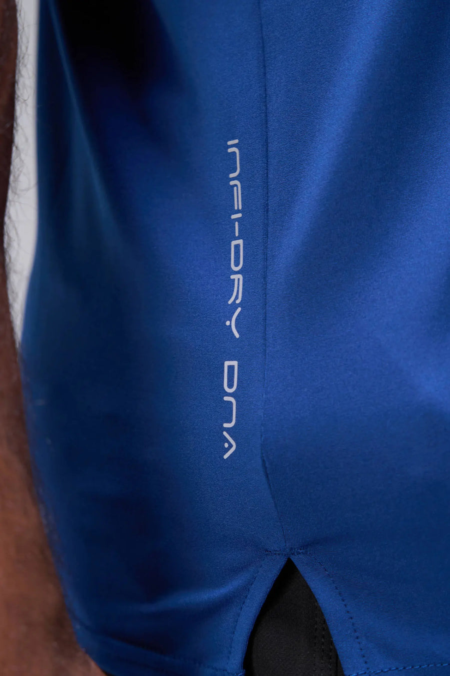 Blue Infi-Dry Muscle Tank featuring lightweight Infi-Dry™ moisture-wicking fabric, premium construction, and performance details by TLF Apparel – side detail view