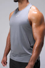 Gray Infi-Dry Muscle Tank with drop armhole construction, athletic fit, and unrestricted mobility for training by TLF Apparel – side view