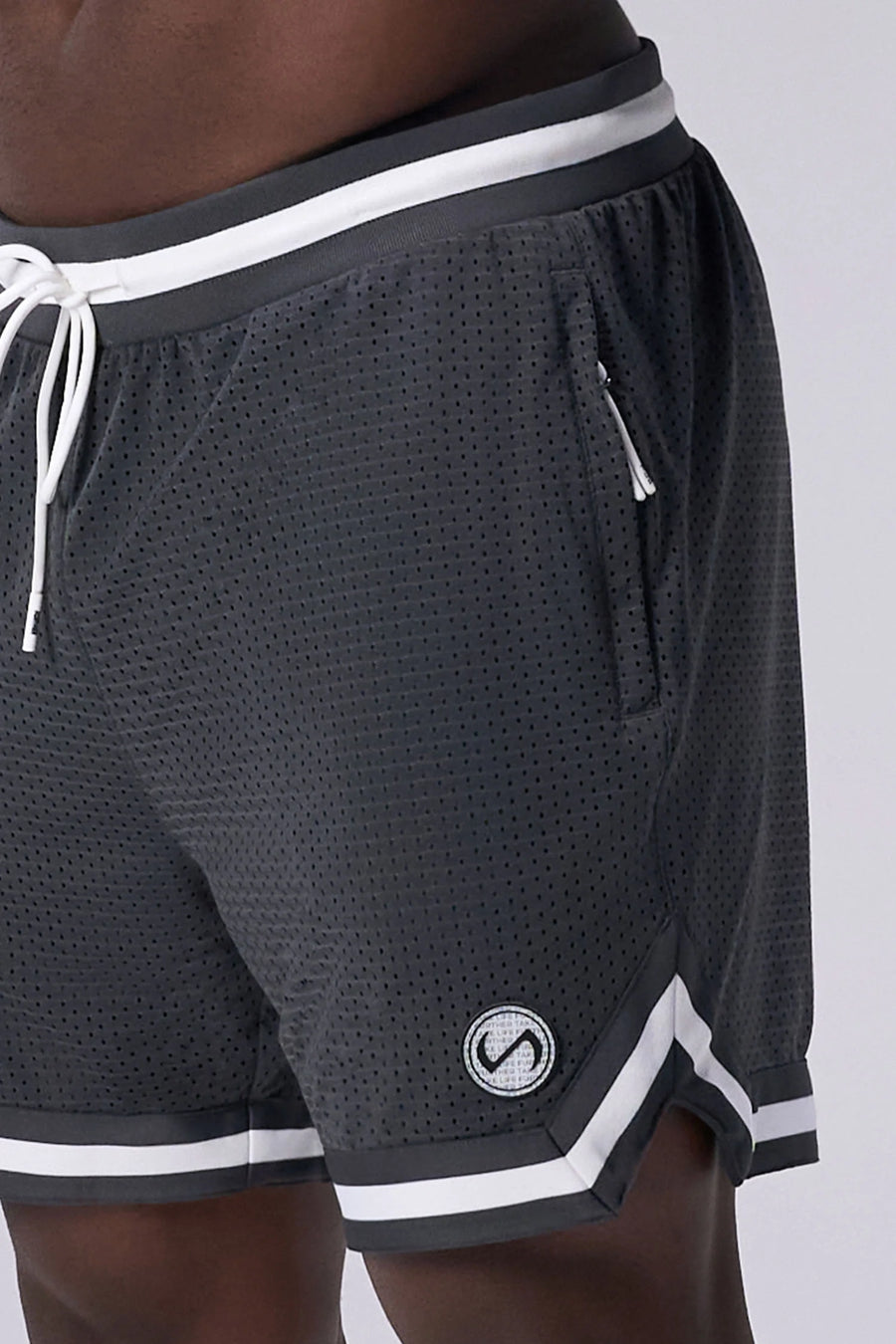 Grey TLF Evolve Mesh 6 Inch Shorts showing athletic side silhouette, zip pocket storage, and lightweight mesh fabric by TLF Apparel – side view