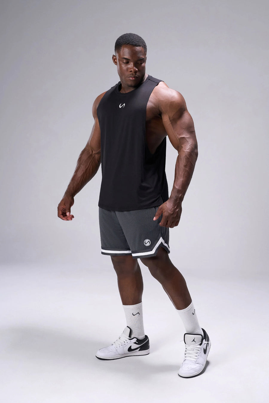 Grey TLF Evolve Mesh 6 Inch Shorts showing 6 inch inseam fit, breathable mesh fabric, and athletic relaxed silhouette by TLF Apparel – side view