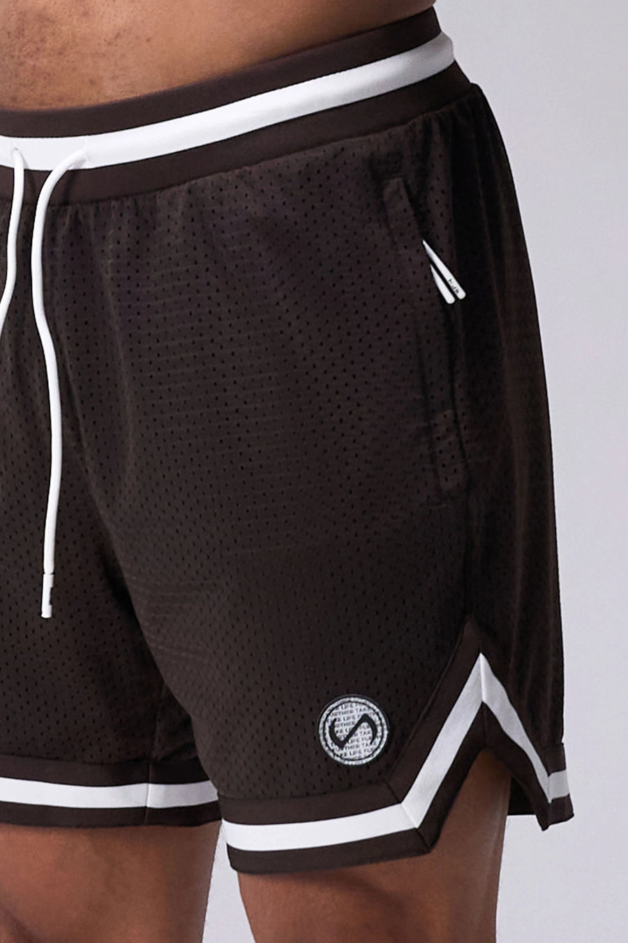 Brown TLF Evolve Mesh 6 Inch Shorts showing athletic side silhouette, zip pocket storage, and lightweight mesh fabric by TLF Apparel – side view
