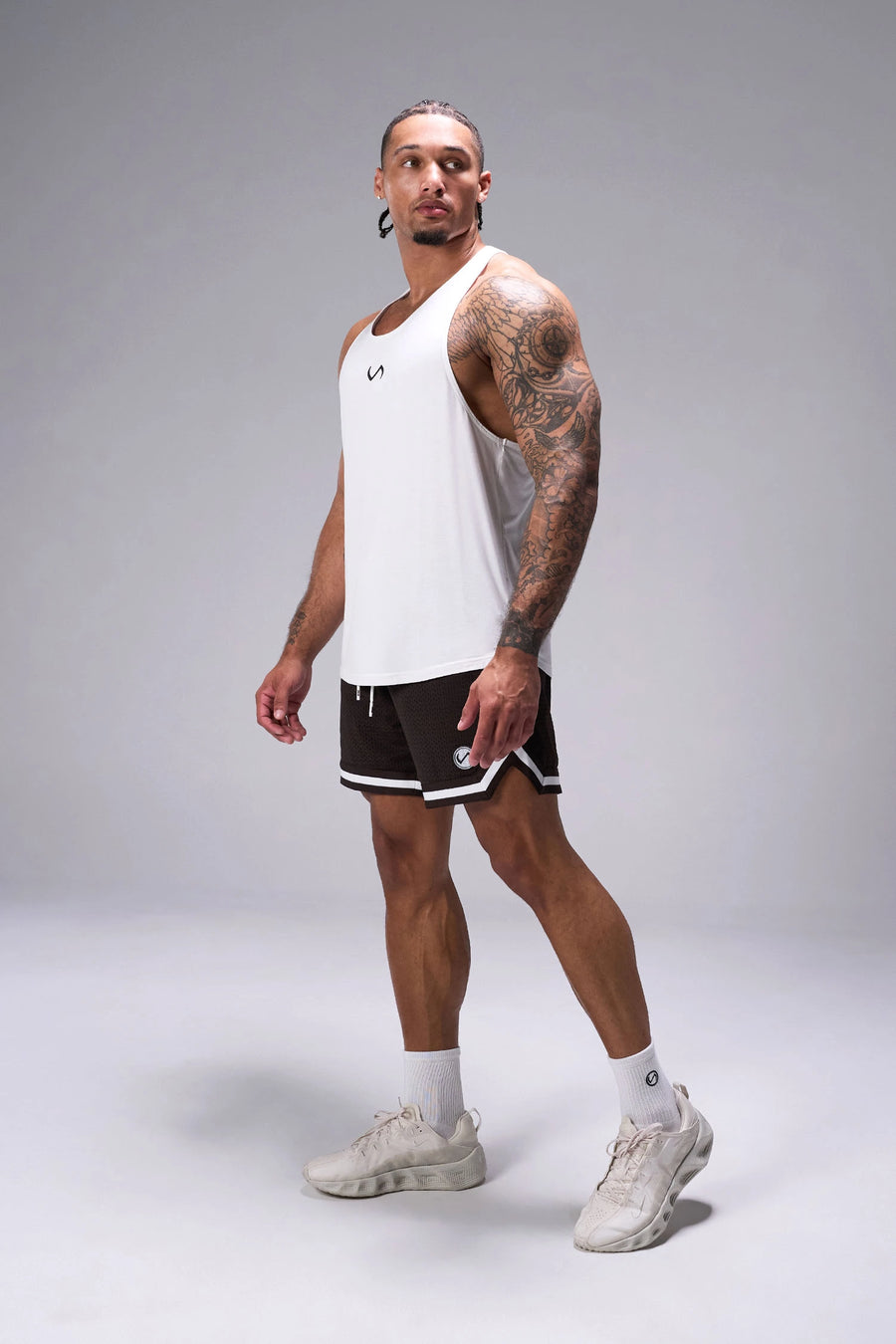 Brown TLF Evolve Mesh 6 Inch Shorts showing 6 inch inseam fit, breathable mesh fabric, and athletic relaxed silhouette by TLF Apparel – side view
