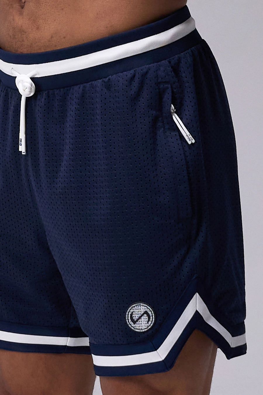 Navy Blue TLF Evolve Mesh 6 Inch Shorts showing athletic side silhouette, zip pocket storage, and lightweight mesh fabric by TLF Apparel – side view