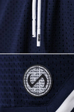 Navy Blue TLF Evolve Mesh 6 Inch Shorts showing Mesh Tech DNA™ fabric, striped ribbed waistband, and premium construction details by TLF Apparel – detail view