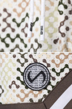 CREAM PRINT TLF Evolve Mesh 6 Inch Shorts showing Mesh Tech DNA™ fabric, striped ribbed waistband, and premium construction details by TLF Apparel – detail view