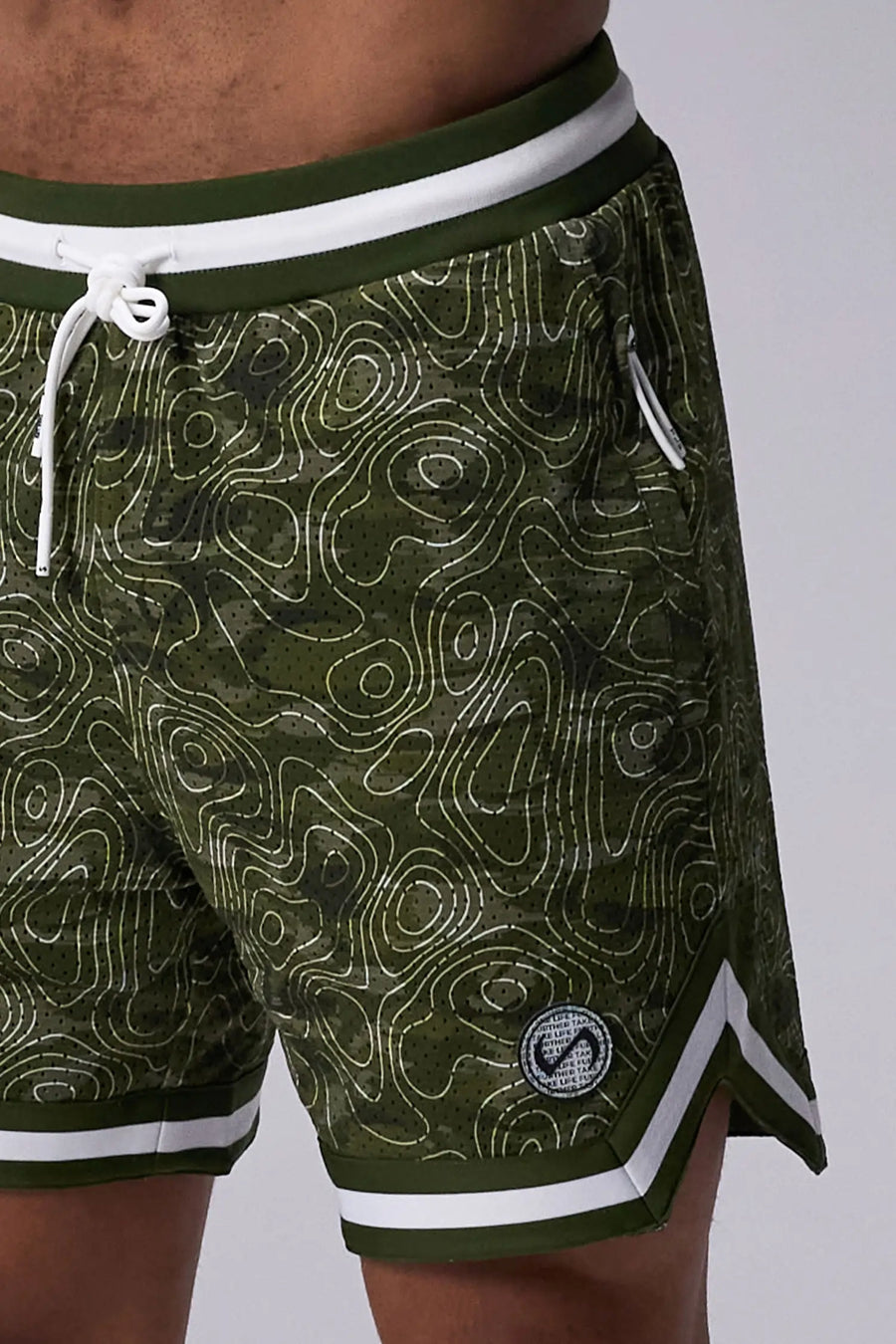 GREEN PRINT TLF Evolve Mesh 6 Inch Shorts showing athletic side silhouette, zip pocket storage, and lightweight mesh fabric by TLF Apparel – side view