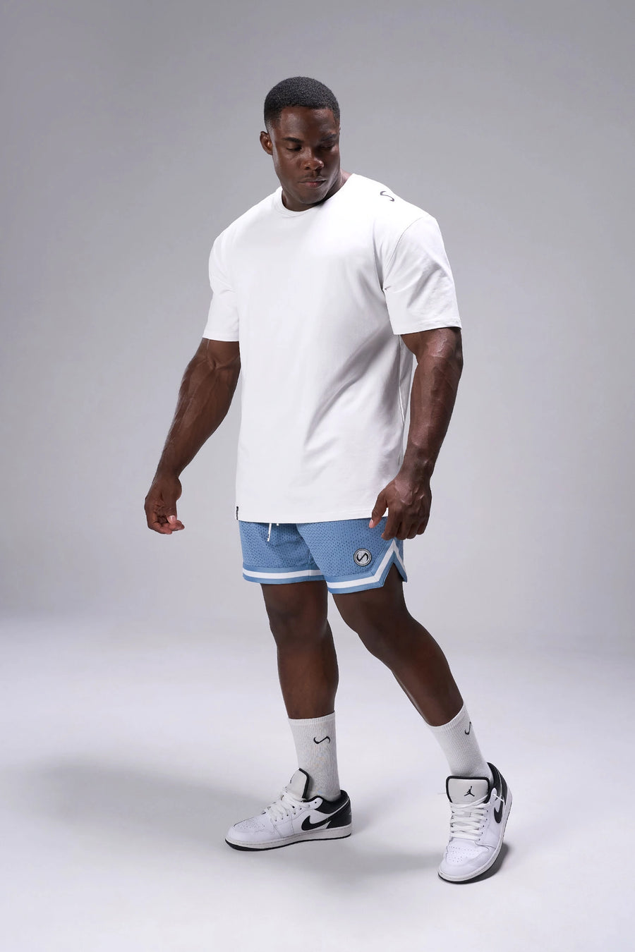Light Blue TLF Evolve Mesh 6 Inch Shorts showing 6 inch inseam fit, breathable mesh fabric, and athletic relaxed silhouette by TLF Apparel – side view