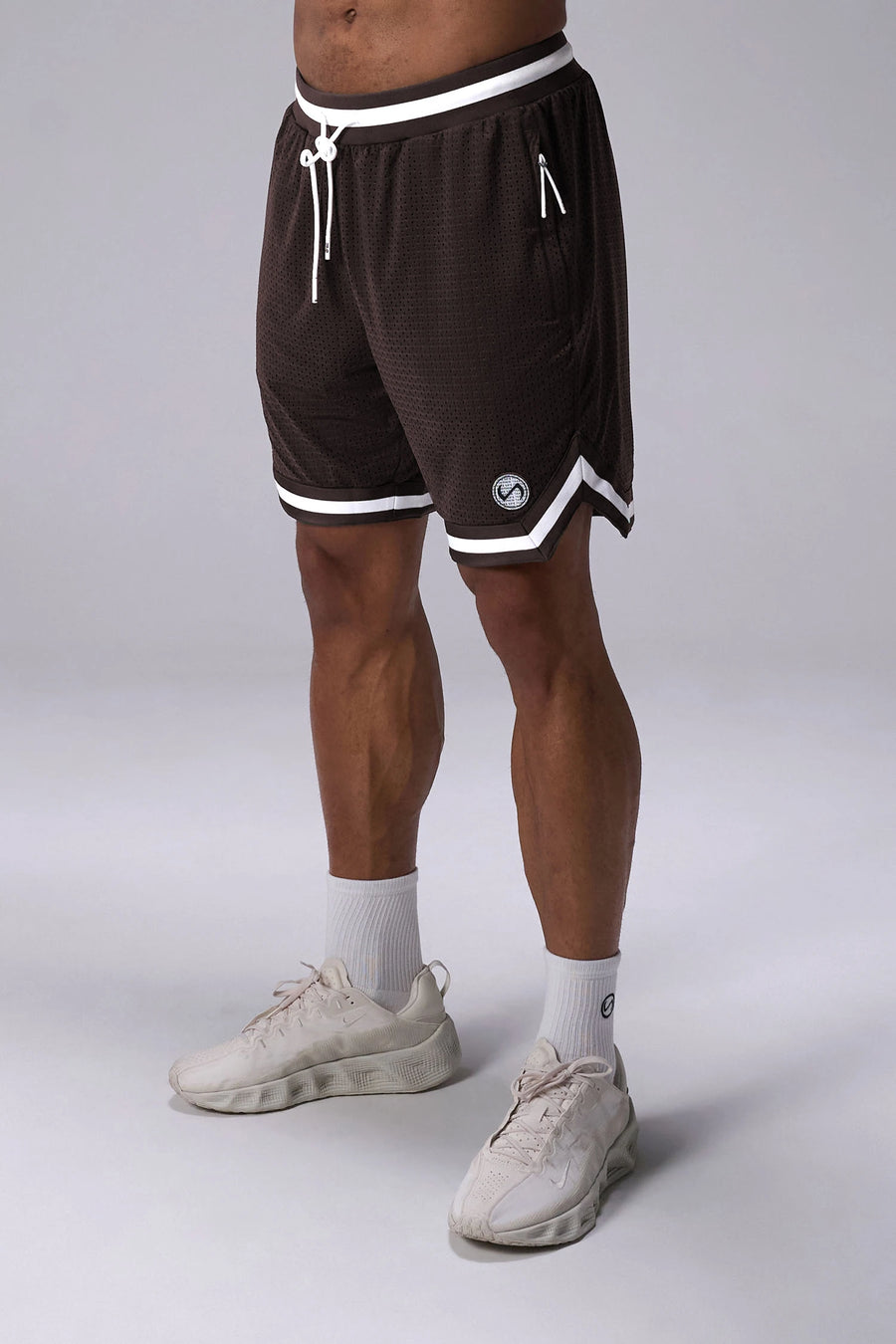 Brown GTS Evolve Mesh 8 Inch Shorts with lightweight breathable mesh fabric, zip pockets, and 4-way stretch performance for gym training and workouts by TLF Apparel – front view