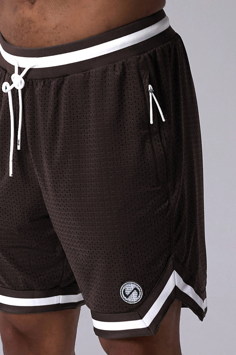 Brown GTS Evolve Mesh 8 Inch Shorts showing athletic side silhouette, zip pocket storage, and lightweight mesh fabric by TLF Apparel – side view