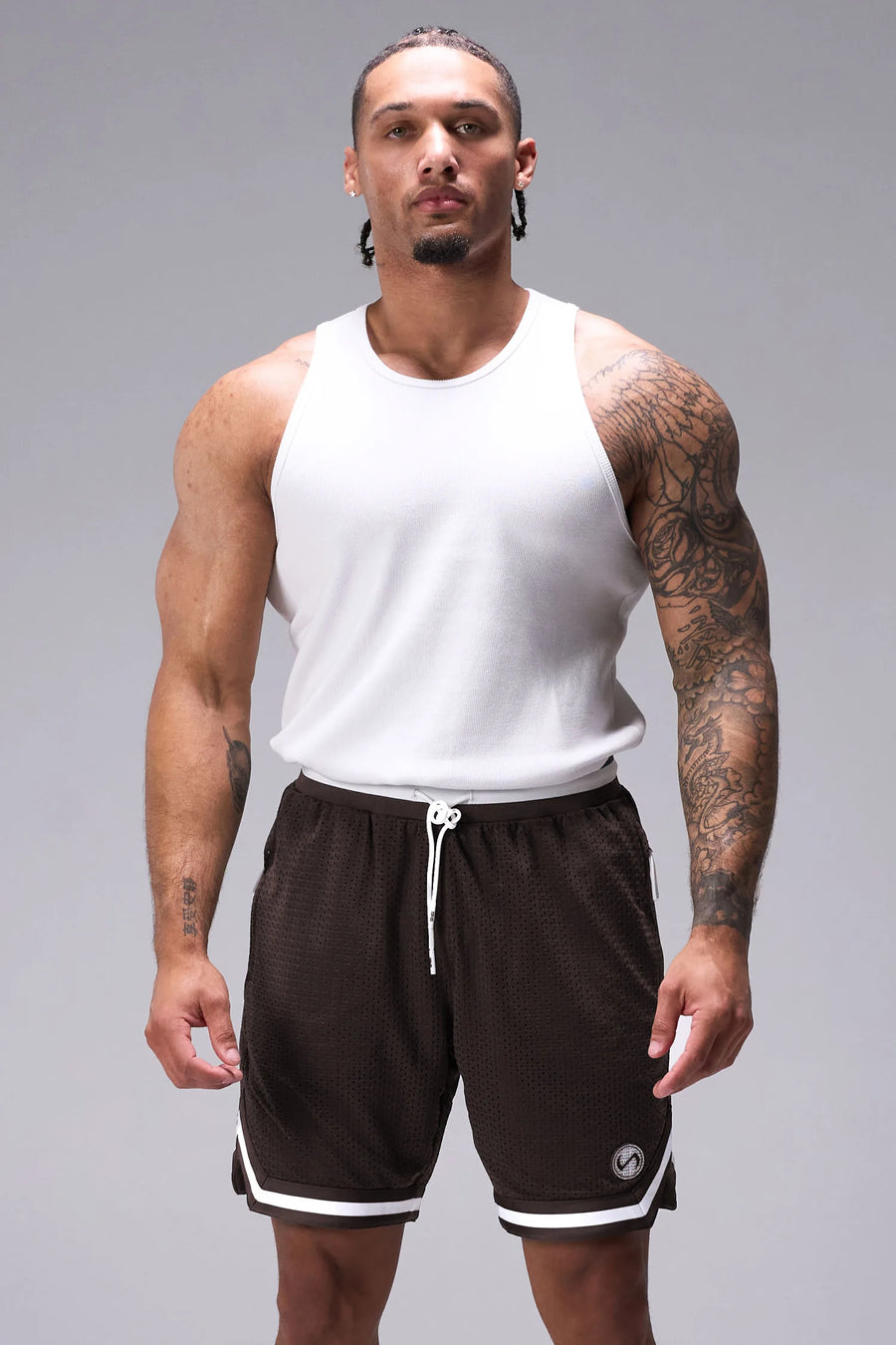Brown GTS Evolve Mesh 8 Inch Shorts with athletic relaxed fit, zip pockets, and lightweight mesh fabric for training and everyday wear by TLF Apparel – front view