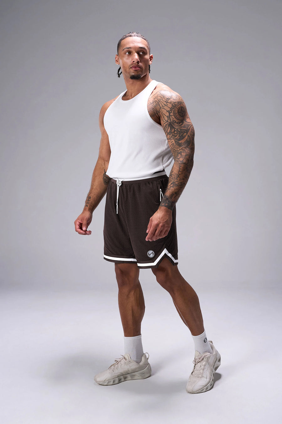 Brown GTS Evolve Mesh 8 Inch Shorts with athletic relaxed fit, zip pockets, and lightweight mesh fabric for training and everyday wear by TLF Apparel – front view 