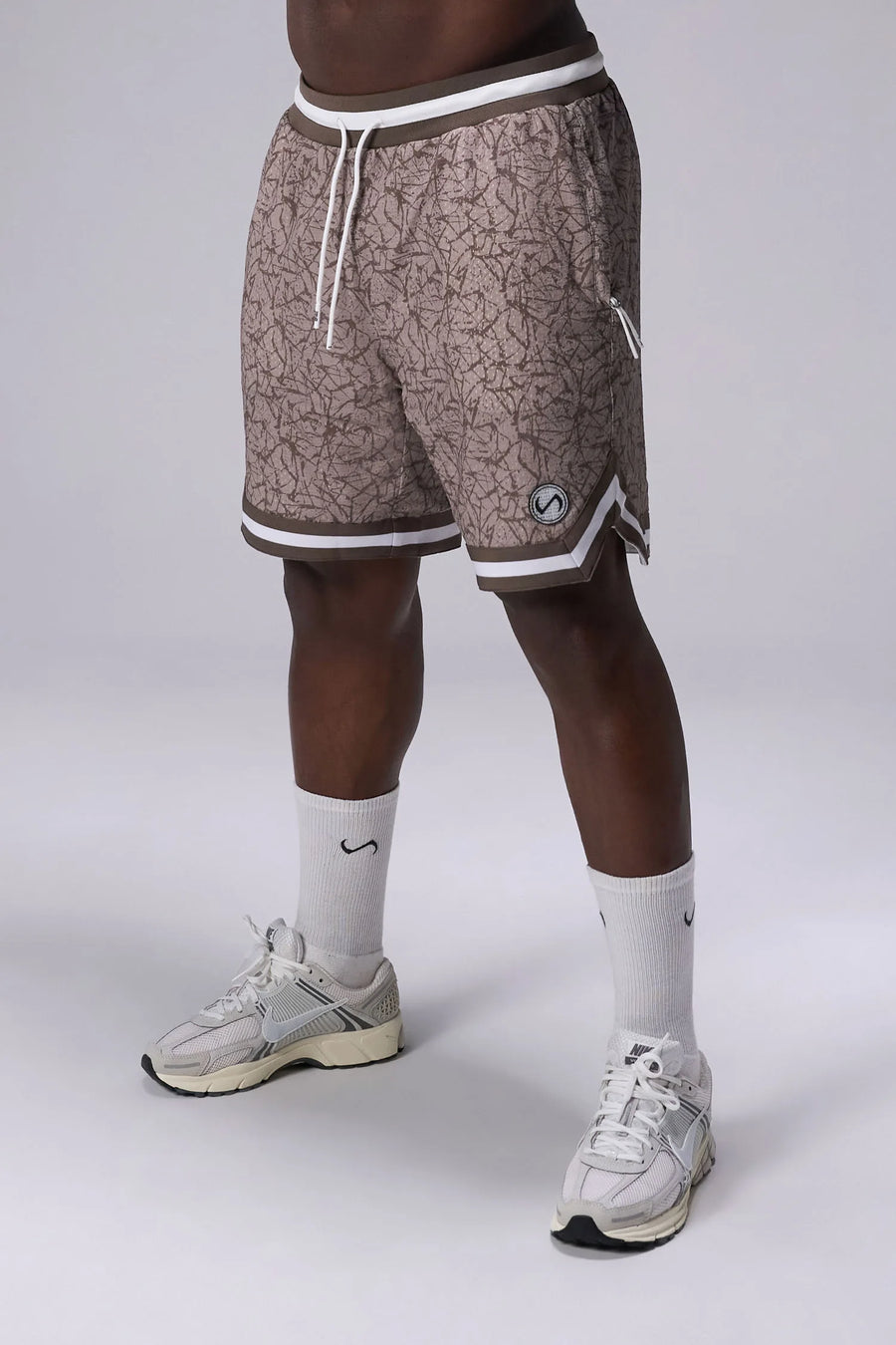 Splatter Print GTS Evolve Mesh 8 Inch Shorts with lightweight breathable mesh fabric, zip pockets, and 4-way stretch performance for gym training and workouts by TLF Apparel – front view