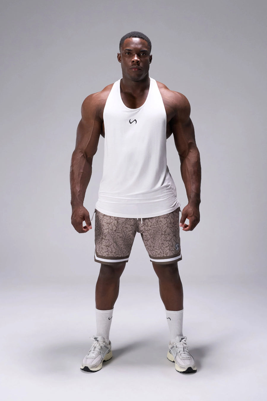Splatter Print GTS Evolve Mesh 8 Inch Shorts with athletic relaxed fit, zip pockets, and lightweight mesh fabric for training and everyday wear by TLF Apparel – front view