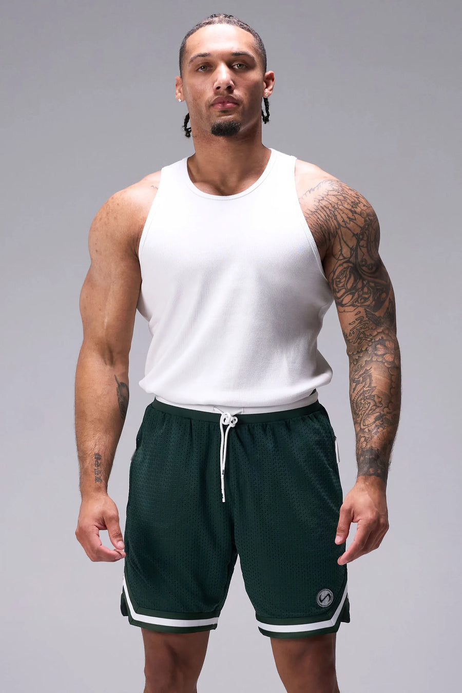 Green GTS Evolve Mesh 8 Inch Shorts with athletic relaxed fit, zip pockets, and lightweight mesh fabric for training and everyday wear by TLF Apparel – front view